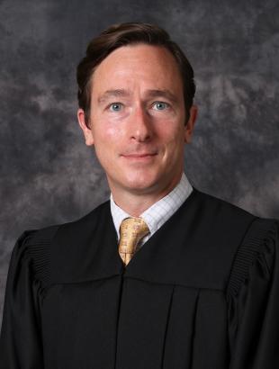Circuit Judge Chad K. Alvaro