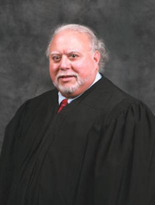 Senior Judge Marc L. Lubet