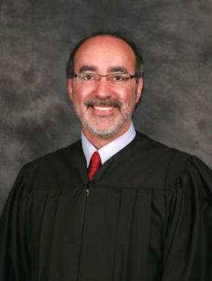 Senior Judge Wilfredo Martinez