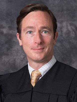 Circuit Judge Chad K. Alvaro