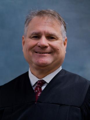 Circuit Judge Craig A. McCarthy