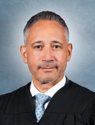 The official judicial photo of Judge Elvis Santiago