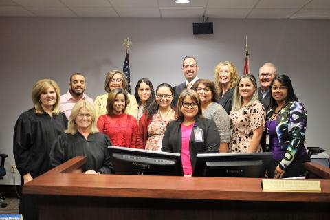 Photo of the group of people who played an instrumental role in the redesign of the Osceola DV injunction room.